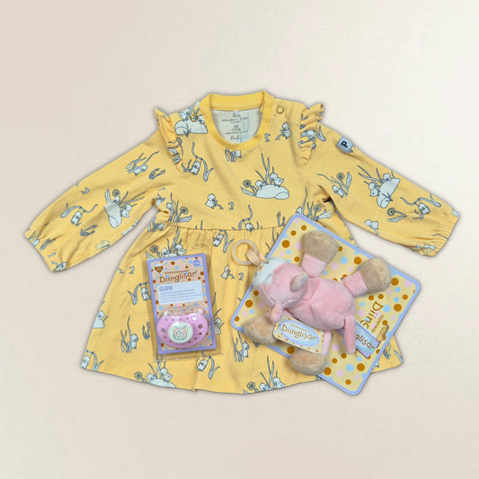 Gul klänning, dinglis och napp. Strl. 56