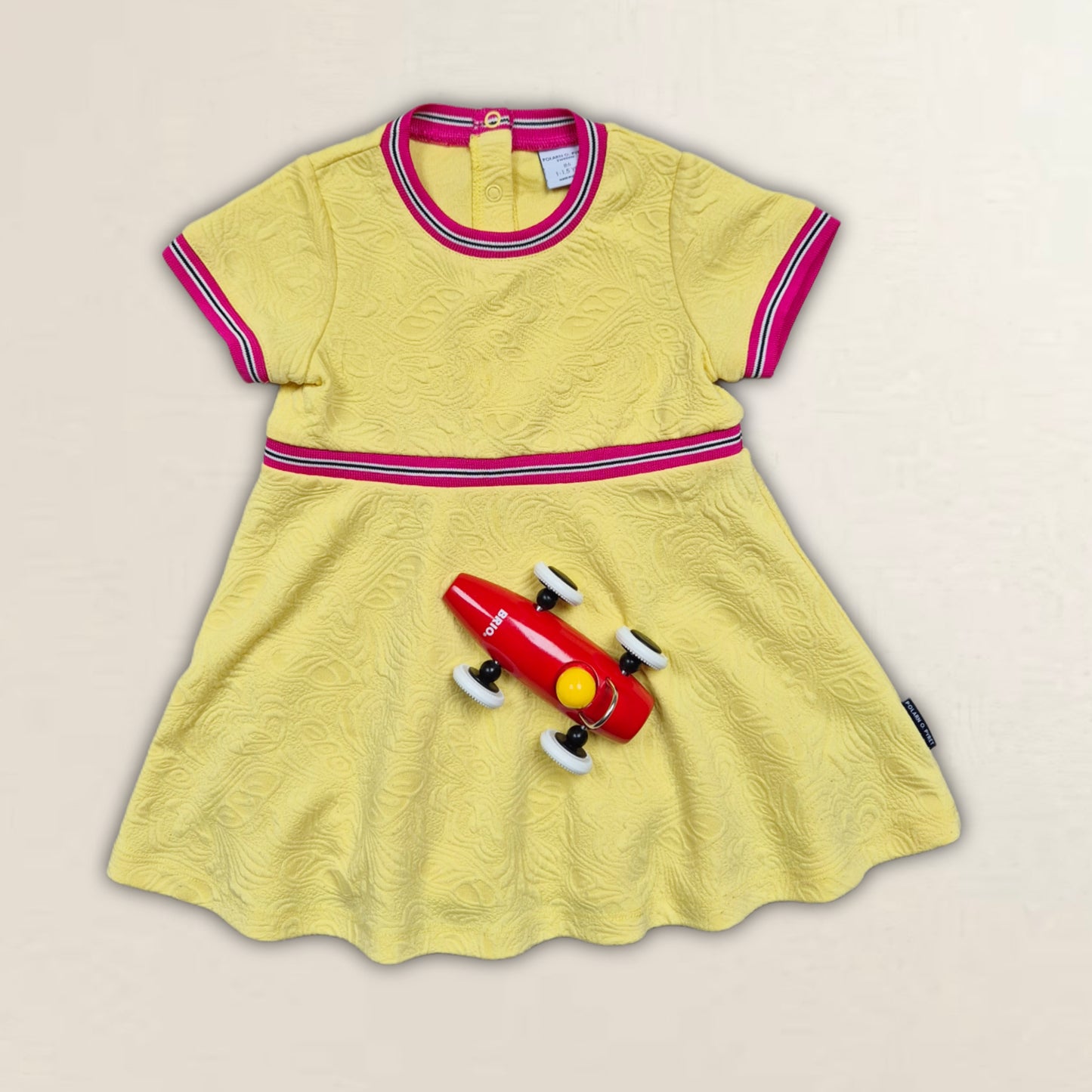 Klänning och Brio-leksak. Strl. 86